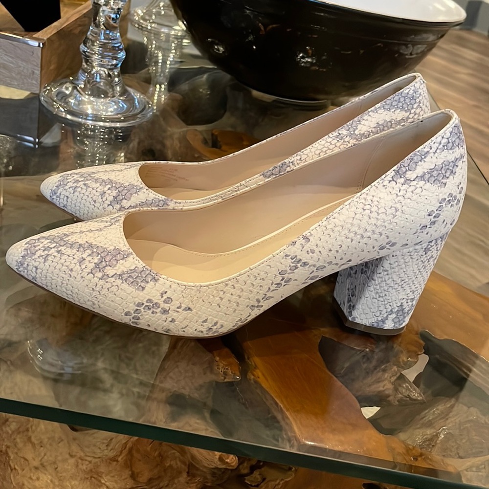 Cream and gray Cole Haan pumps. Lightly worn. Size 8.5